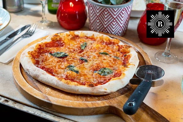 Cocktail and Pizza for Two at Revolution Bars